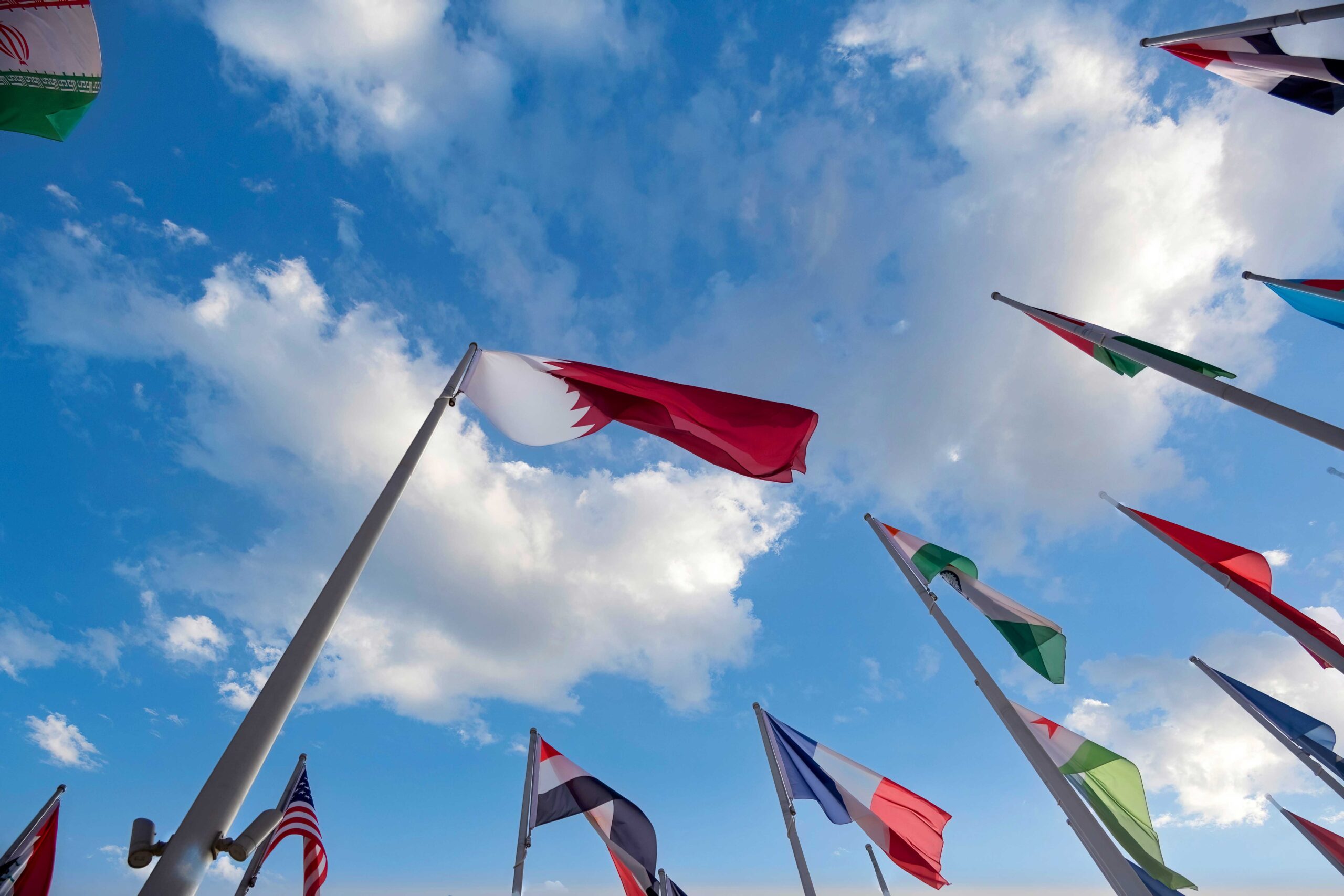 oha, Qatar - April 18, 2025: The Flag Plaza, displays 119 flags from countries with authorized diplomatic missions, including flags of the European Union, the United Nation and the GCC