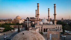 A church next to a mosque, peaceful coexistence in Syria.