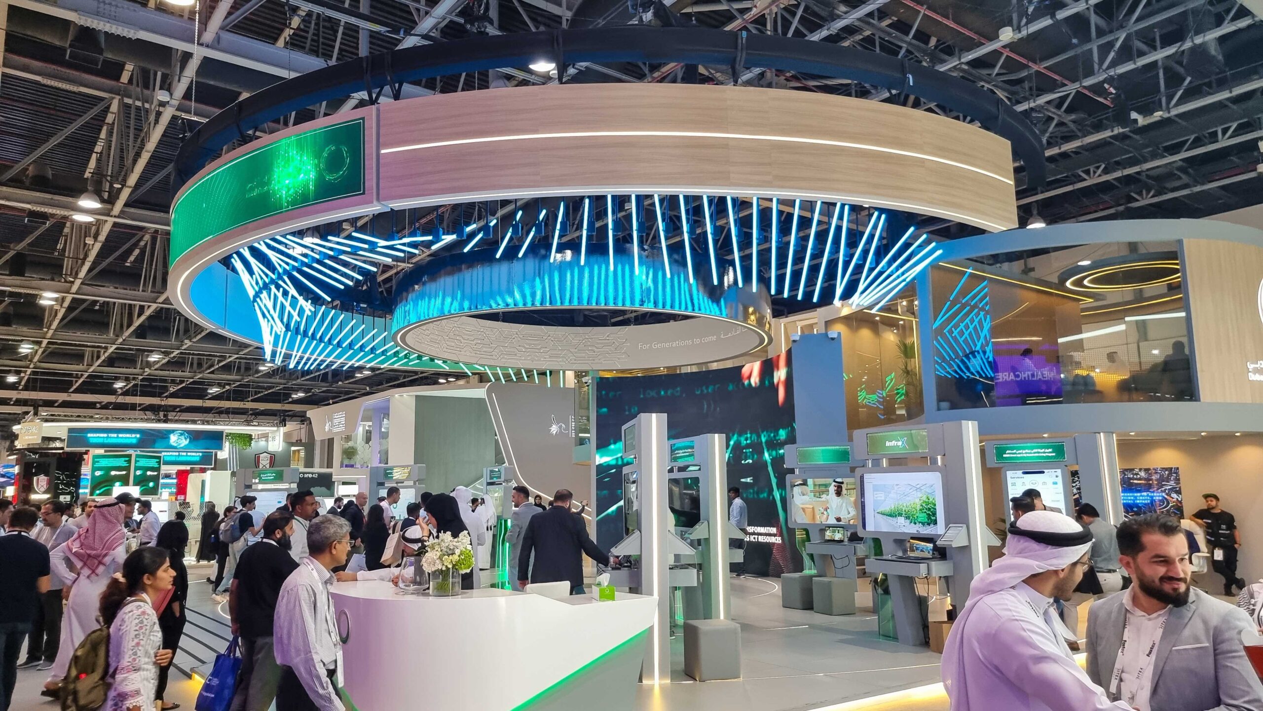Visitors walking through DEWA Dubai Electricity and water Authority pavilion at 43rd GITEX Global 2023, largest tech and startup event in the world in Dubai, United Arab Emirates - October 16, 2023