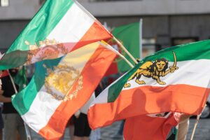 The Lion and Sun flag, a historic national flag of Iran consisting of a green-white-red horizontal tricolour charged with the Lion and Sun emblem.