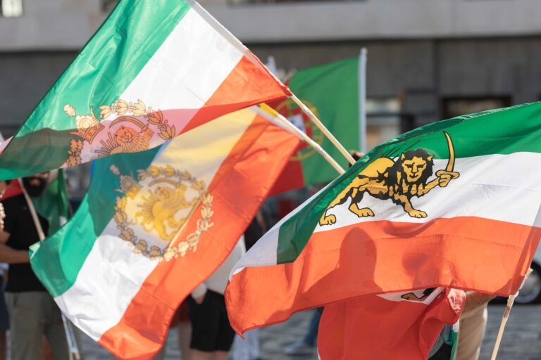 The Lion and Sun flag, a historic national flag of Iran consisting of a green-white-red horizontal tricolour charged with the Lion and Sun emblem.