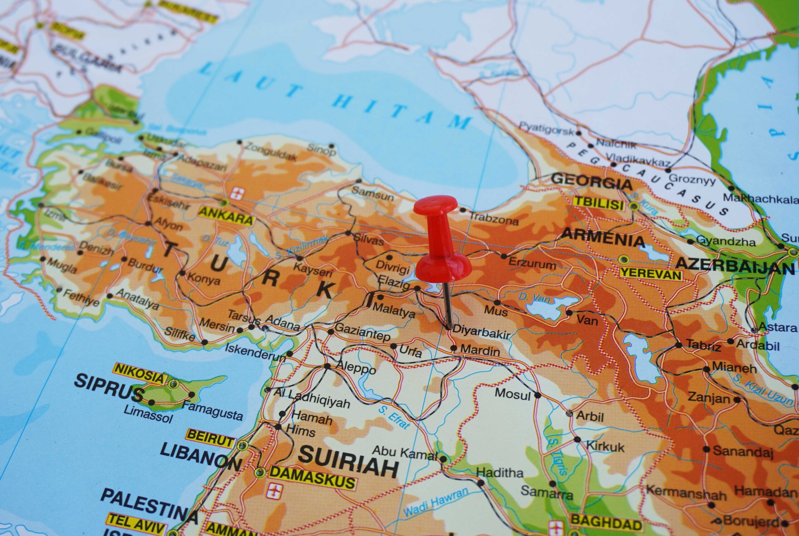 View of Diyarbakir, is the largest Kurdish-majority city in Turkey, on geographical map of Asia, marked with a red push pin.