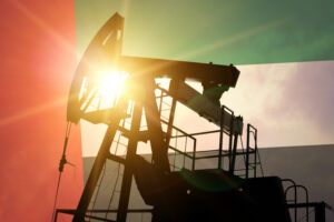 Oil pump on background of flag of UAE