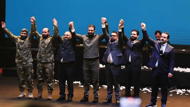 Syrian President Ahmad Al-Sharaa appears in military uniform during a ceremony held at the Presidential Palace, marking the first anniversary of the fall of the Assad regime.