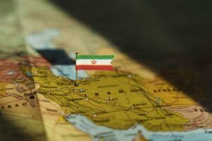Iran flag on Middle east geopolitical map.