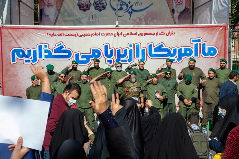 Tehran Iran - November 4, 2022, a line of Iranian Islamic Revolutionary Guard Corps troops crossing the street. In the march, military forces were present with the people.