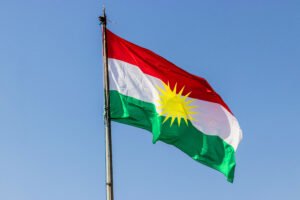 Flag of Kurdistan above Koy Sanjaq town, Kurdistan Region of Iraq