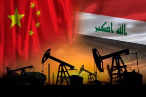 China and Iraq oil industry concept. Chinese and Iraqi flags over oil field